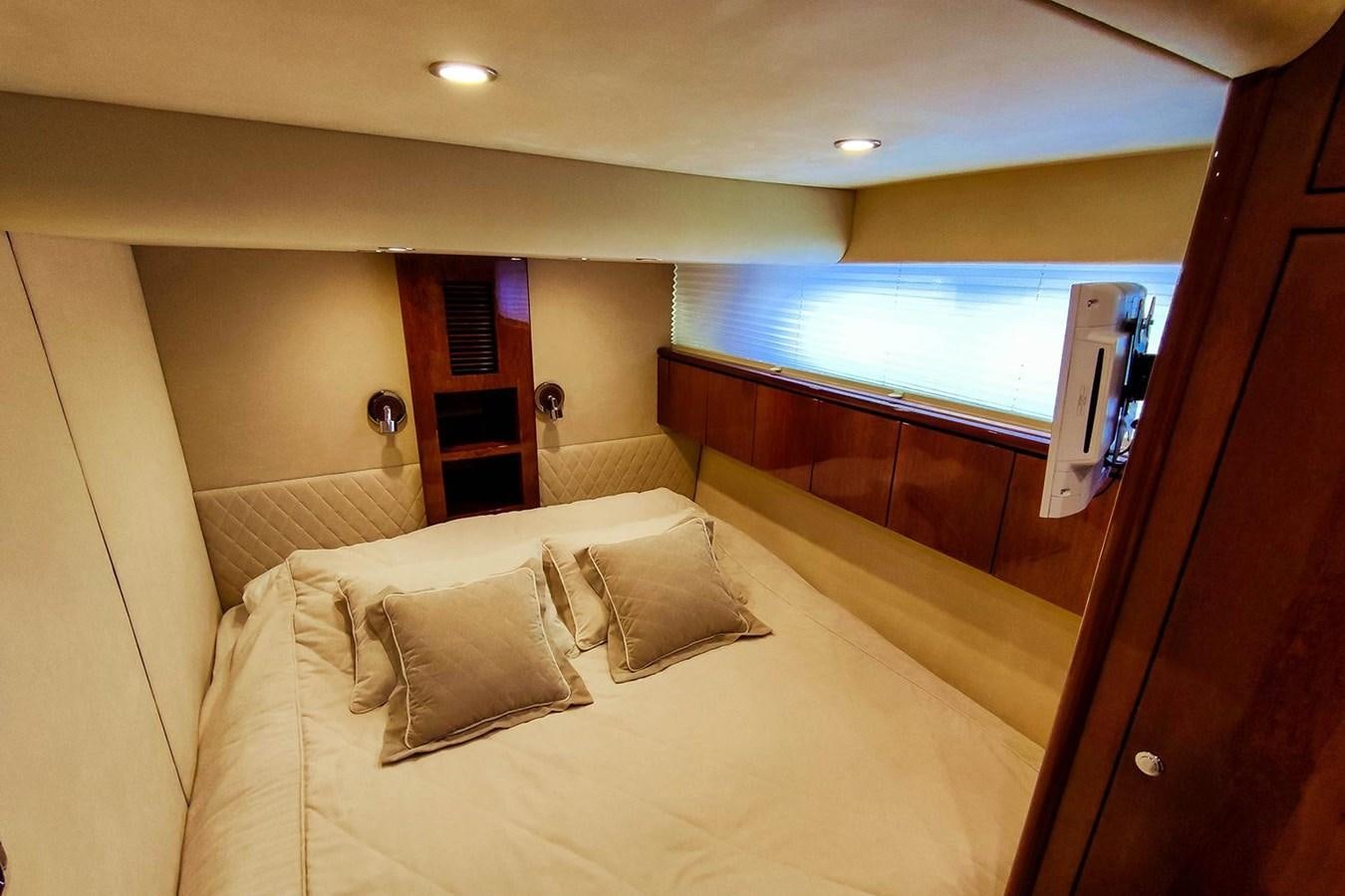 a bed in a room aboard SEVEN Yacht for Sale