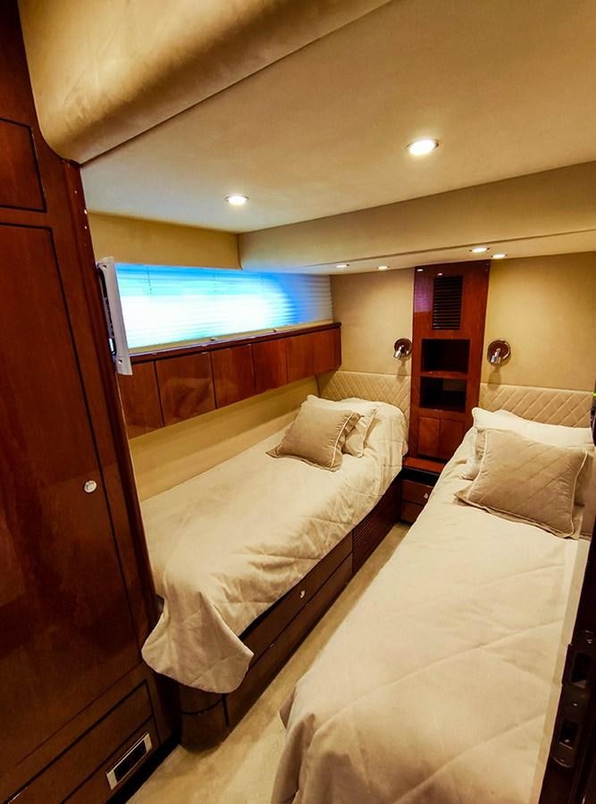 a room with two beds aboard SEVEN Yacht for Sale