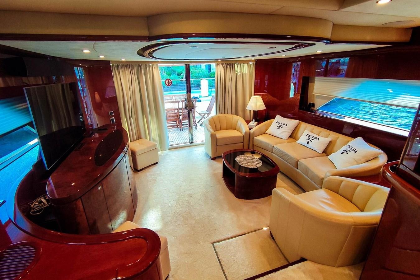 a living room with a large window aboard SEVEN Yacht for Sale
