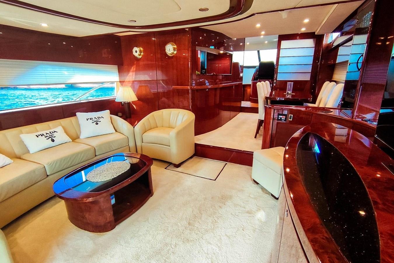 a room with a couch and a table aboard SEVEN Yacht for Sale