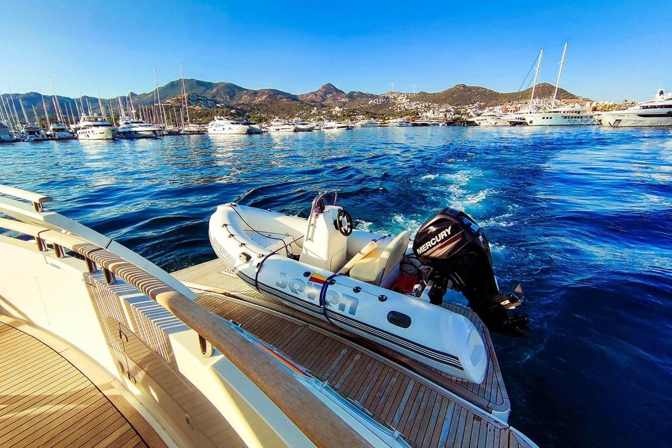 a boat with a motor on it aboard SEVEN Yacht for Sale