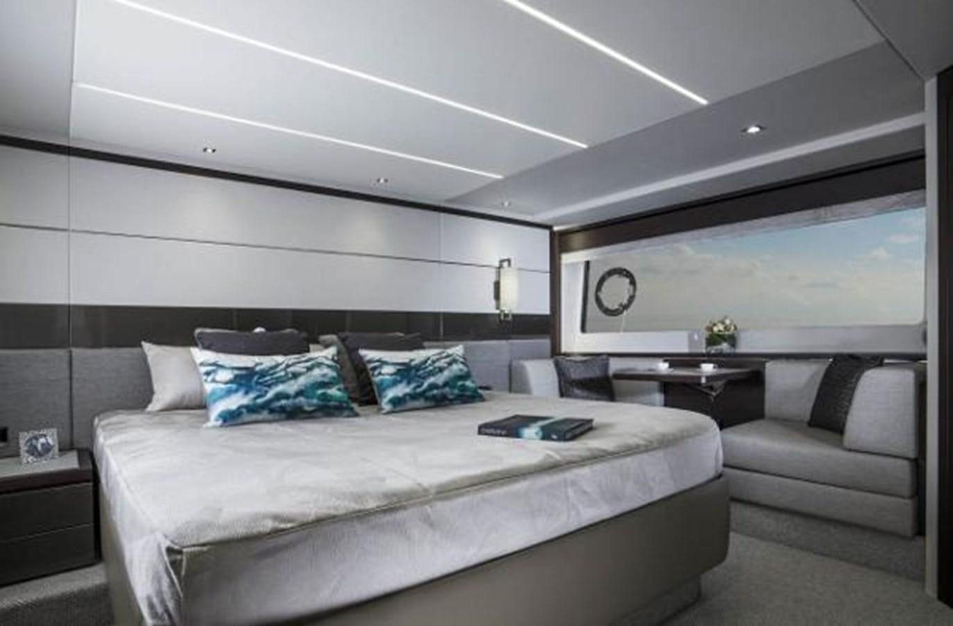a modern bedroom with a bed aboard 74 PREDATOR Yacht for Sale