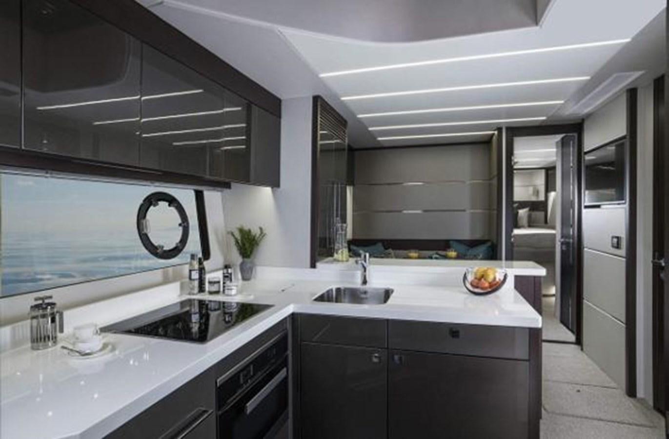a kitchen with white cabinets aboard 74 PREDATOR Yacht for Sale