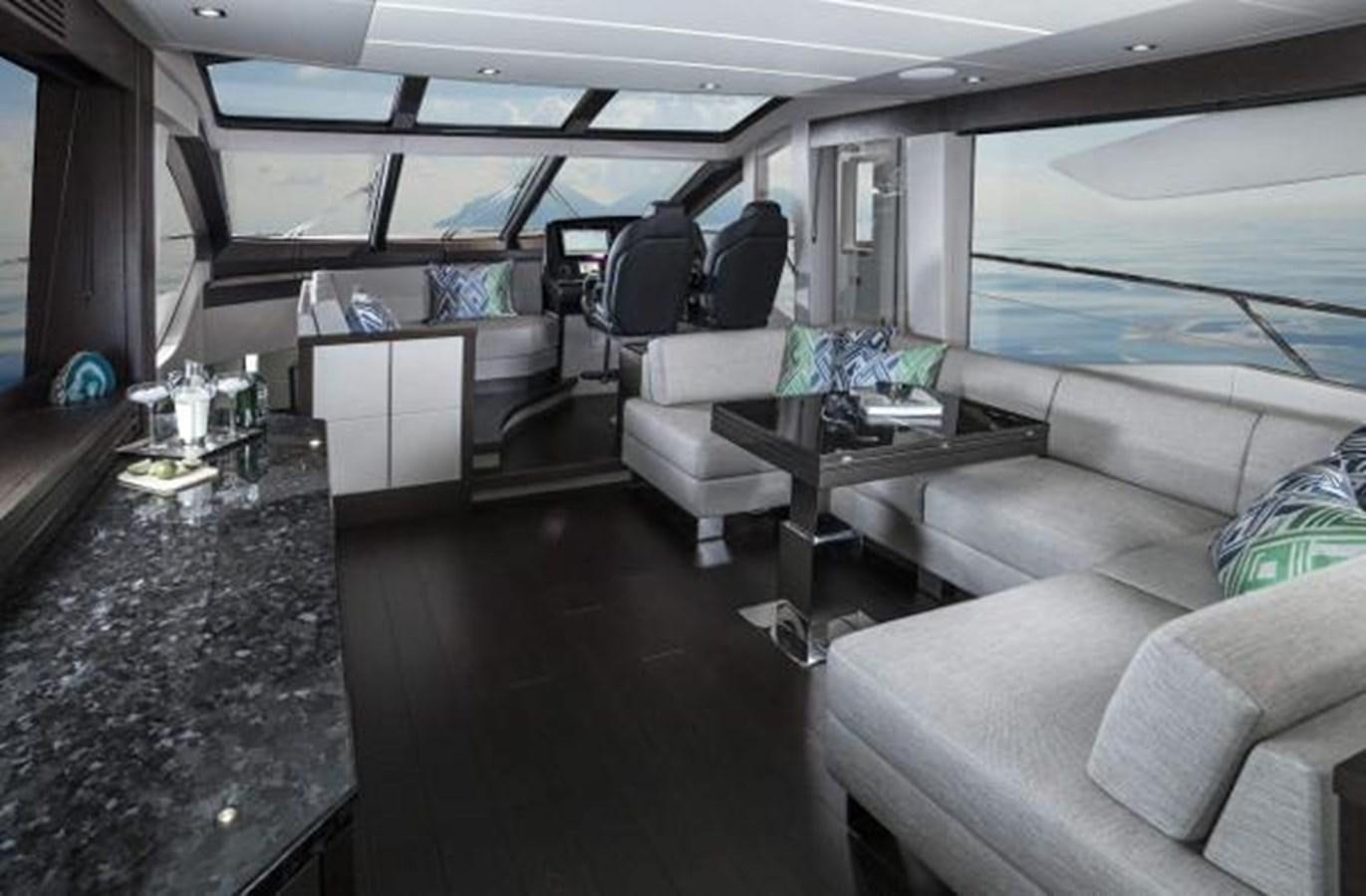 inside of a vehicle with a table and chairs aboard 74 PREDATOR Yacht for Sale