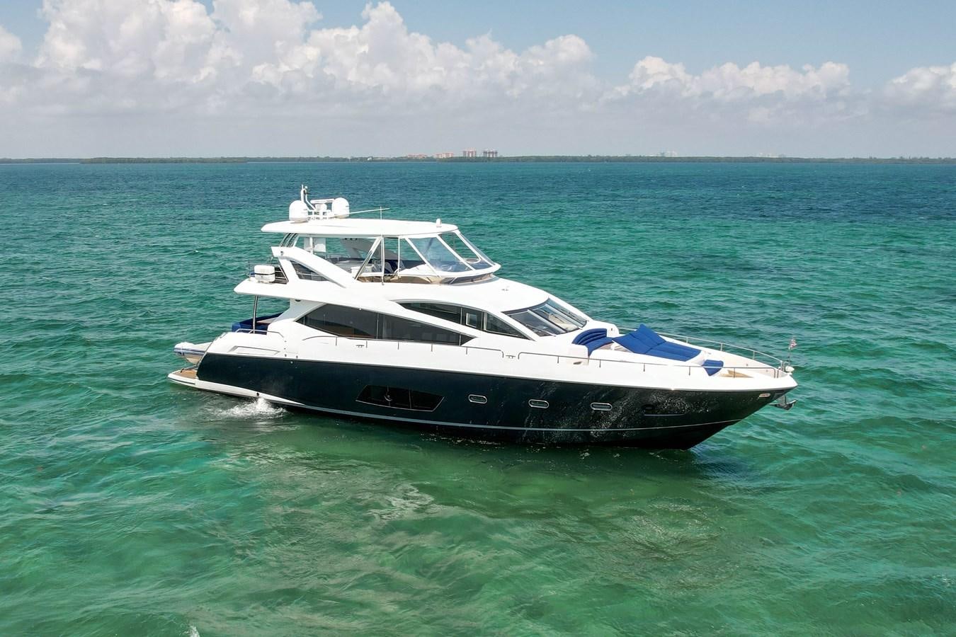 a boat in the water aboard SUNSEEKER 73 2013 Yacht for Sale
