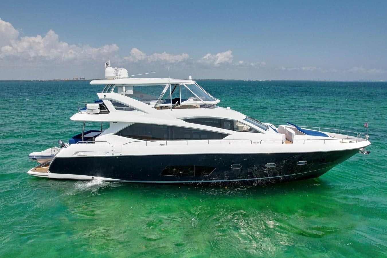 a boat in the water aboard SUNSEEKER 73 2013 Yacht for Sale