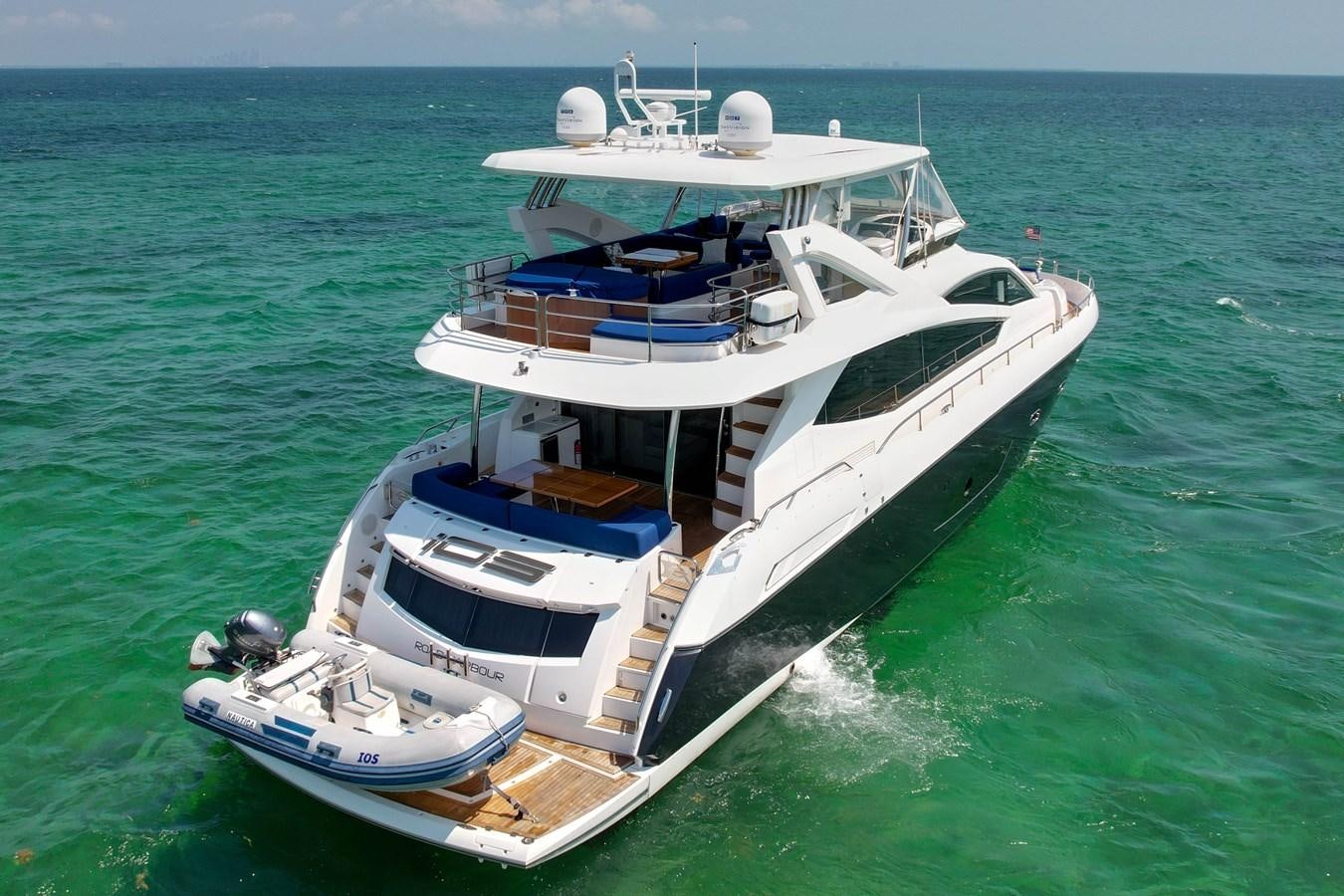 a boat on the water aboard SUNSEEKER 73 2013 Yacht for Sale