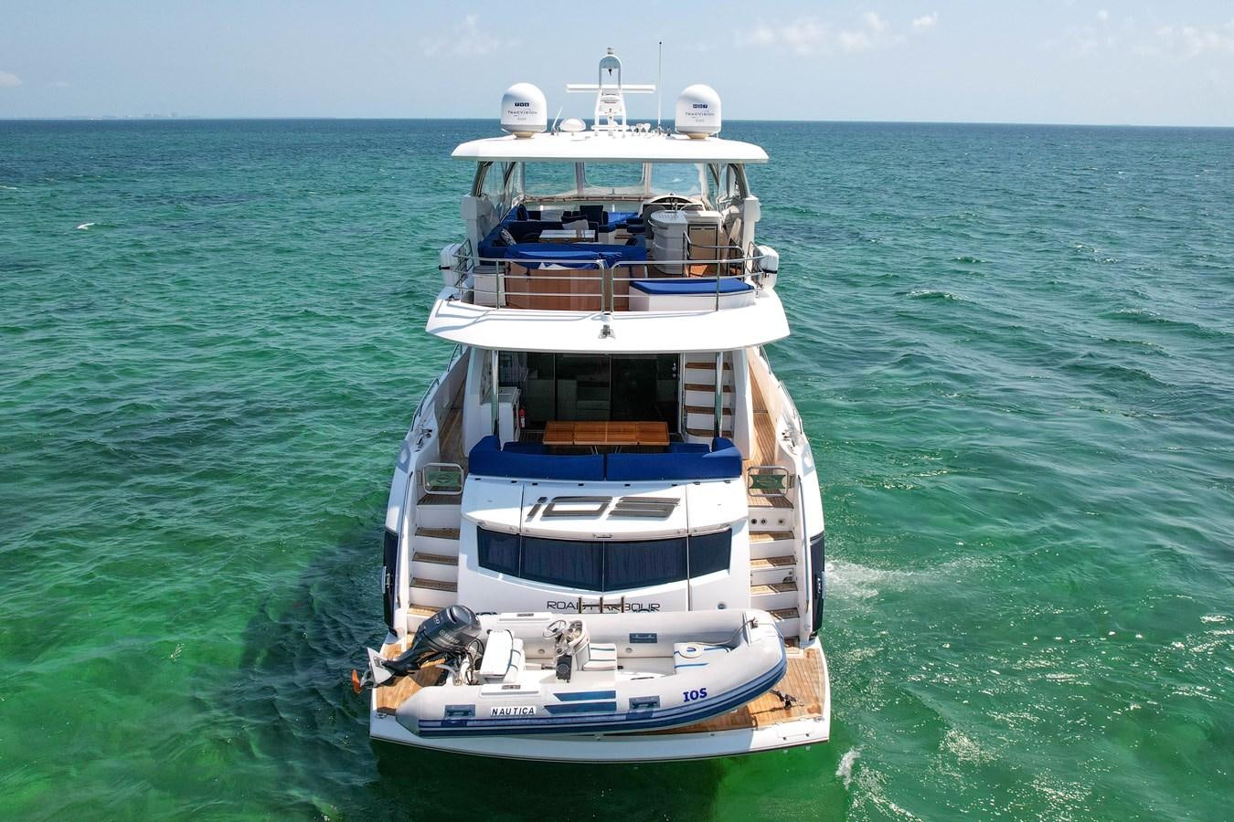 a boat in the water aboard SUNSEEKER 73 2013 Yacht for Sale
