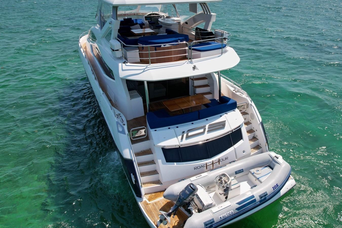 a boat on the water aboard SUNSEEKER 73 2013 Yacht for Sale