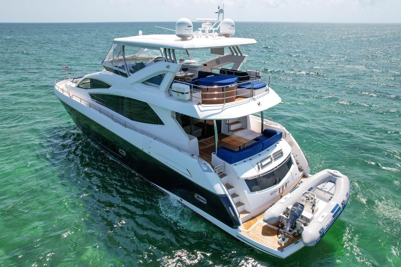 a boat in the water aboard SUNSEEKER 73 2013 Yacht for Sale
