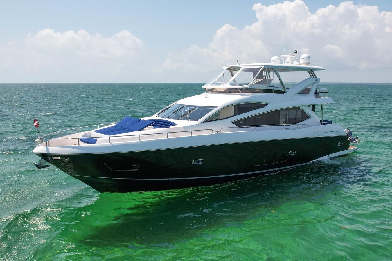 a boat in the water aboard SUNSEEKER 73 2013 Yacht for Sale