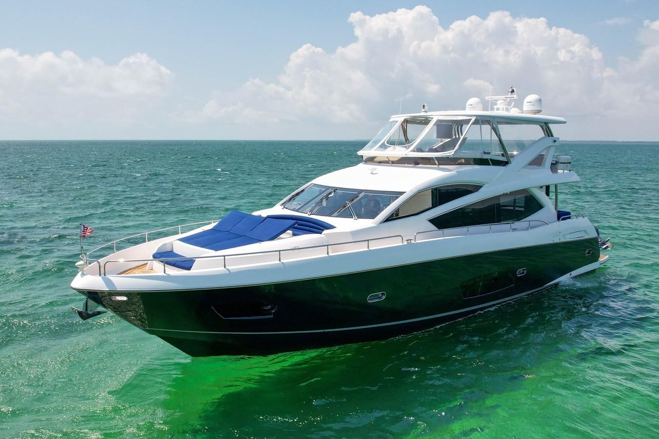 a boat on the water aboard SUNSEEKER 73 2013 Yacht for Sale
