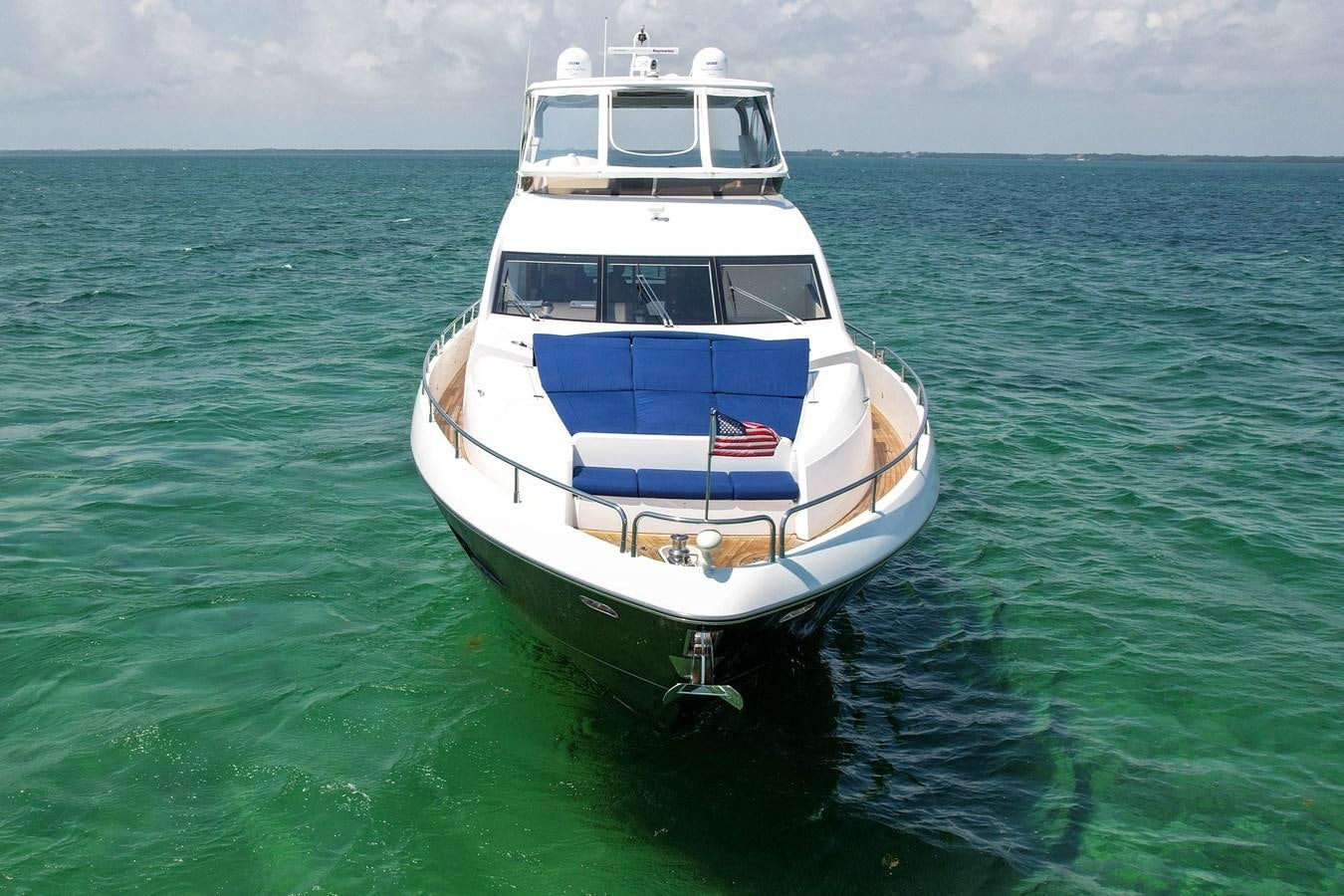 a boat in the water aboard SUNSEEKER 73 2013 Yacht for Sale