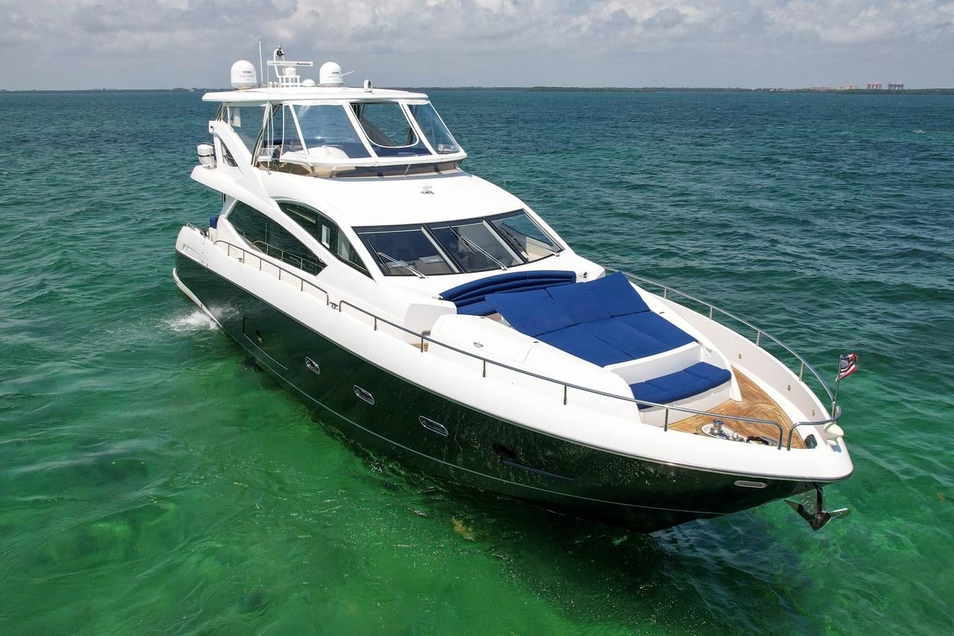 a white yacht in the ocean aboard SUNSEEKER 73 2013 Yacht for Sale