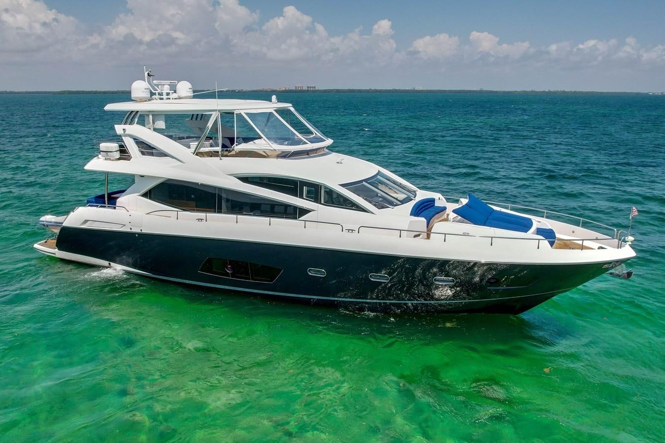 a boat in the water aboard SUNSEEKER 73 2013 Yacht for Sale