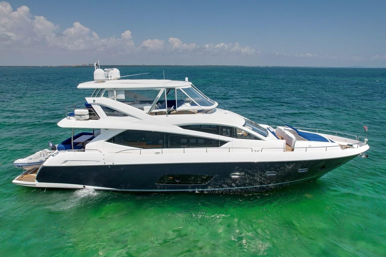 a white yacht in the ocean aboard SUNSEEKER 73 2013 Yacht for Sale