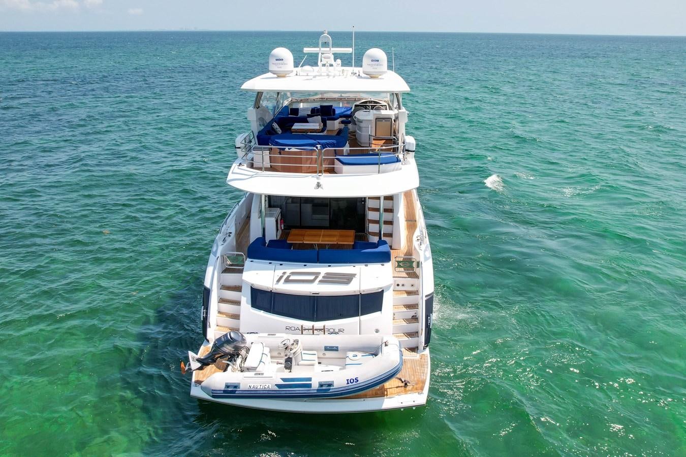 a boat in the water aboard SUNSEEKER 73 2013 Yacht for Sale