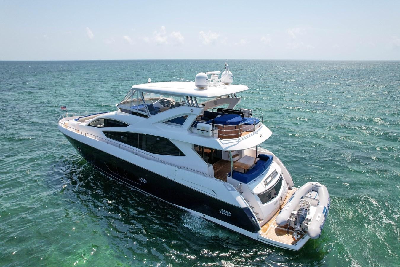 a boat in the water aboard SUNSEEKER 73 2013 Yacht for Sale