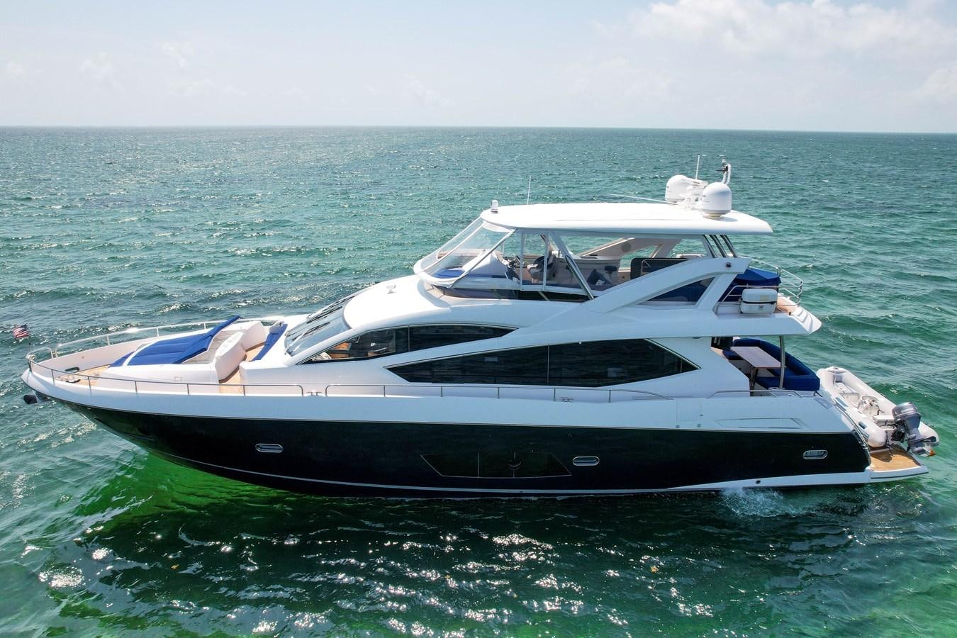 a boat in the water aboard SUNSEEKER 73 2013 Yacht for Sale