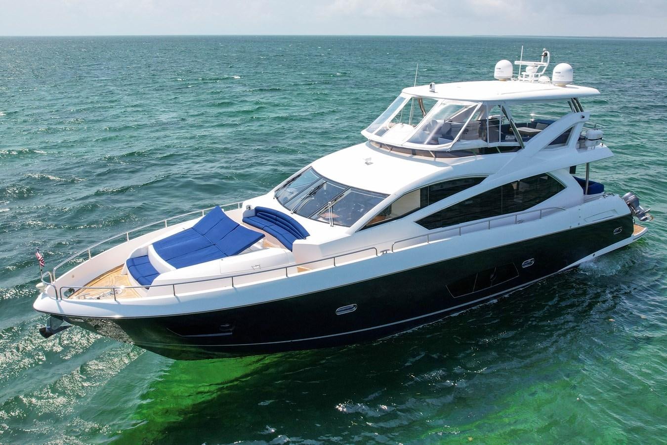 a boat on the water aboard SUNSEEKER 73 2013 Yacht for Sale
