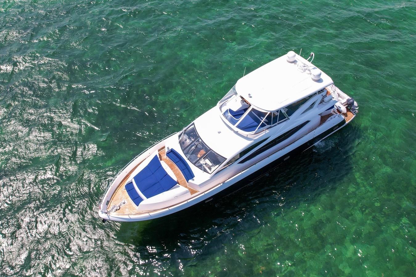 a boat in the water aboard SUNSEEKER 73 2013 Yacht for Sale