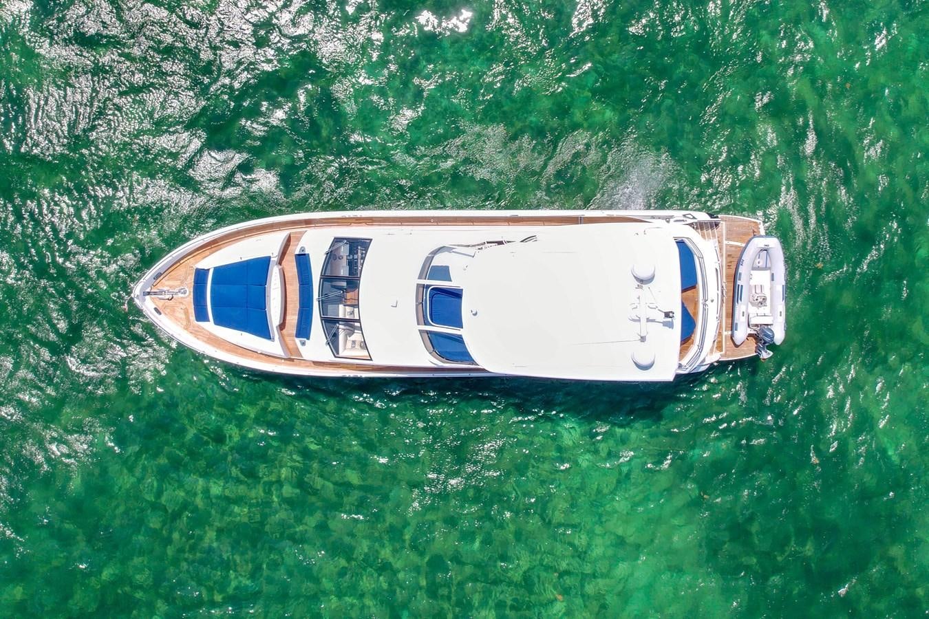 a small boat in the water aboard SUNSEEKER 73 2013 Yacht for Sale