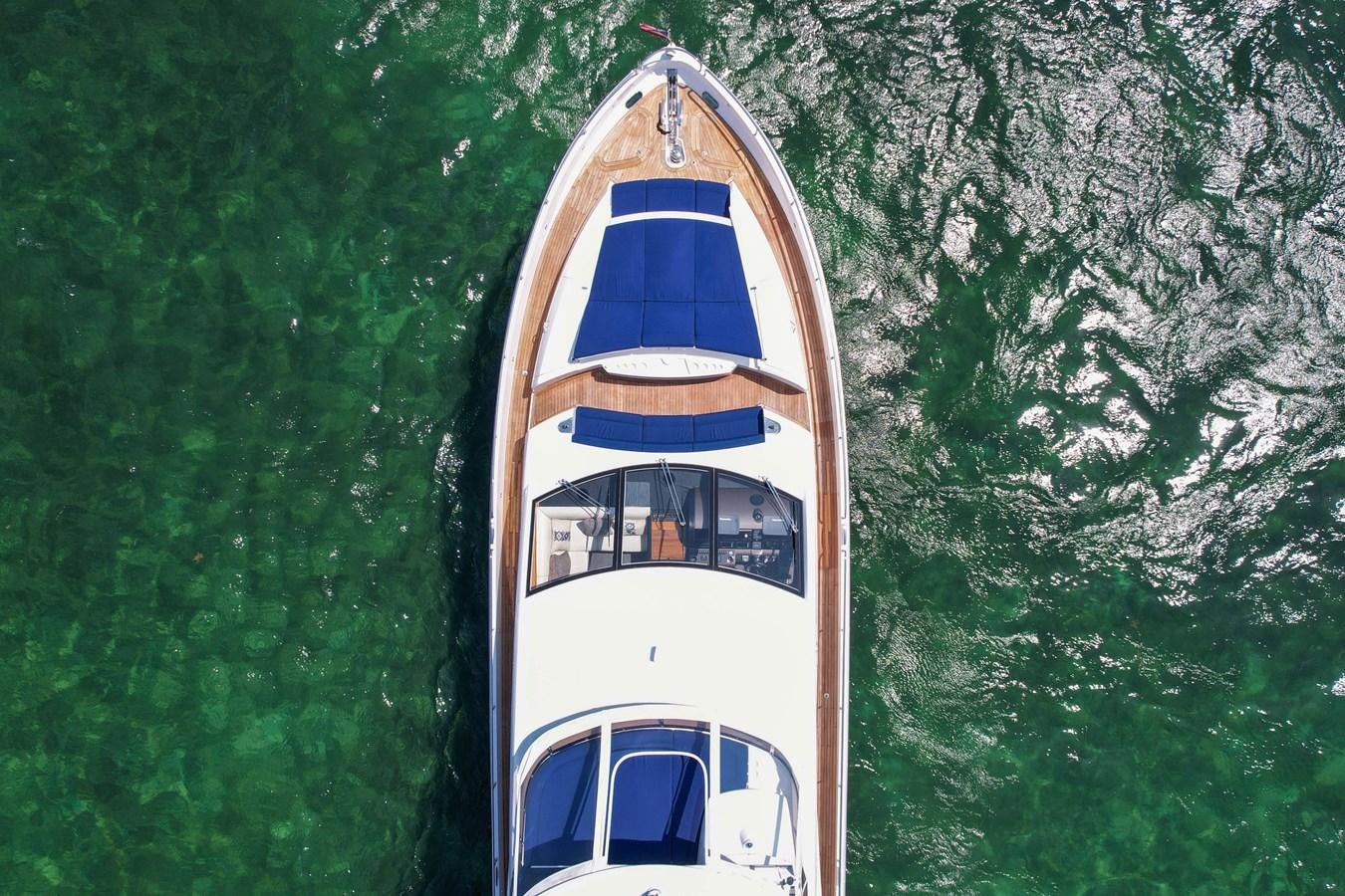 a small white house aboard SUNSEEKER 73 2013 Yacht for Sale