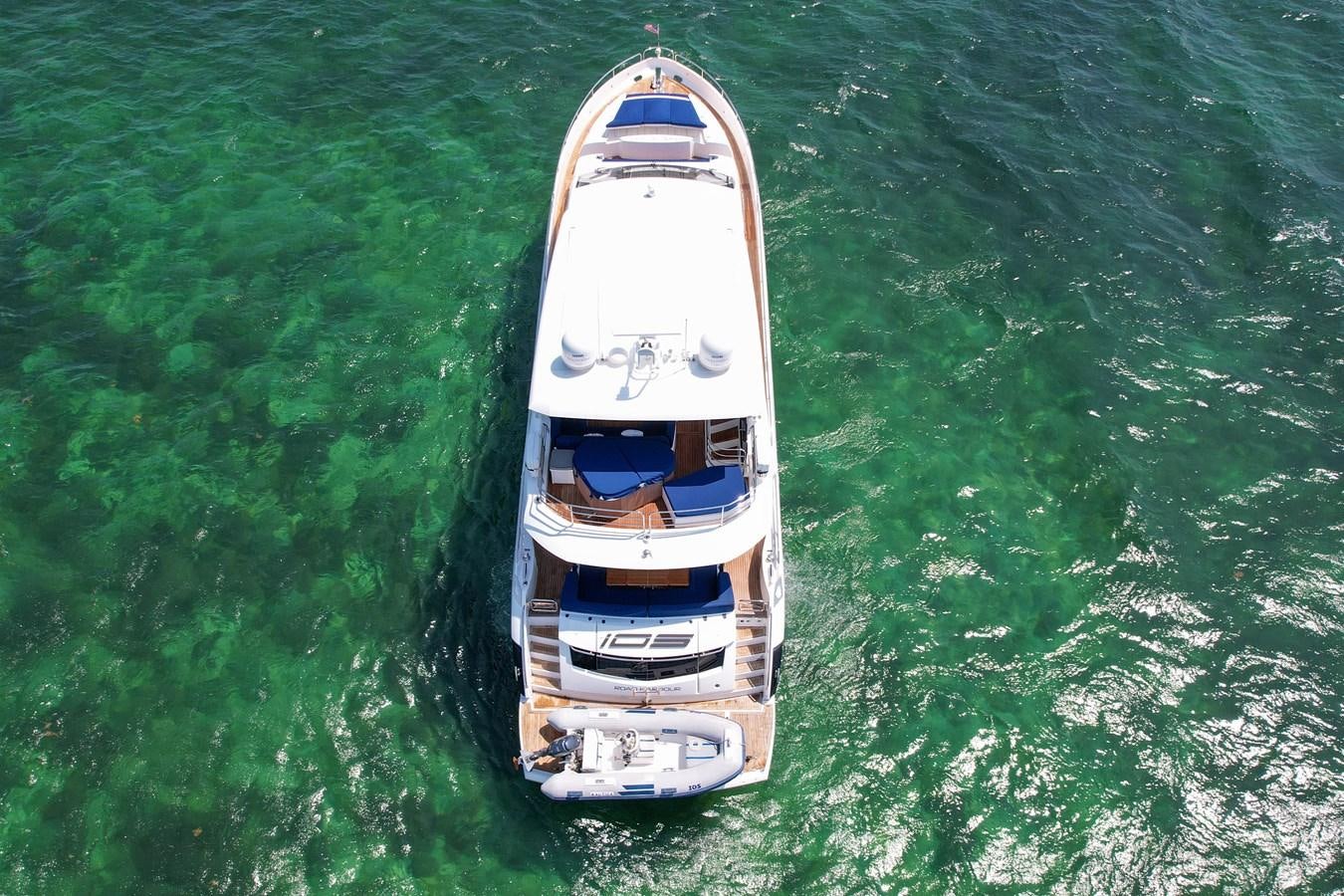 a boat in the water aboard SUNSEEKER 73 2013 Yacht for Sale