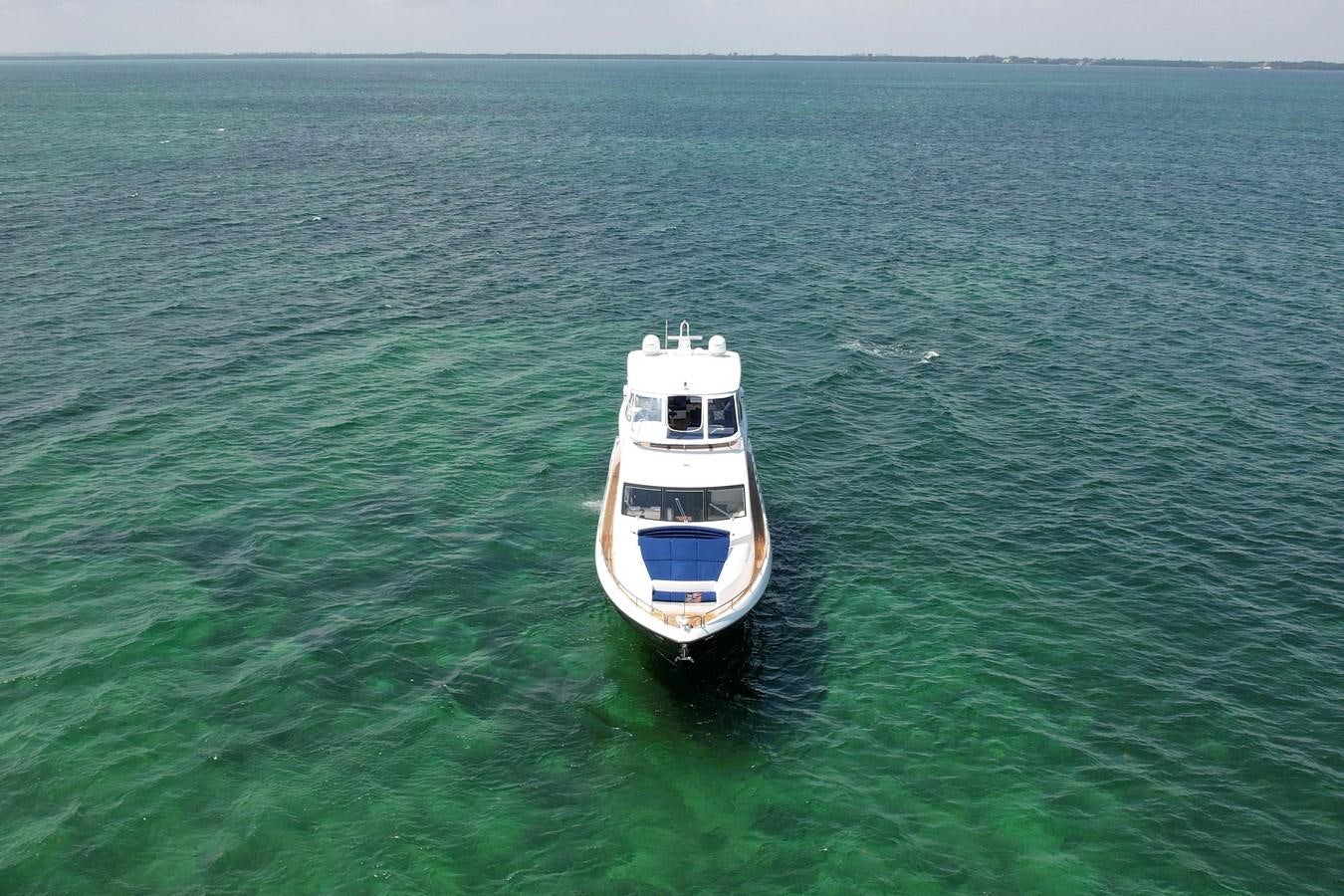 a boat in the water aboard SUNSEEKER 73 2013 Yacht for Sale