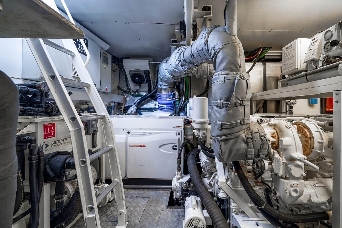 a person working on a machine aboard SUNSEEKER 73 2013 Yacht for Sale