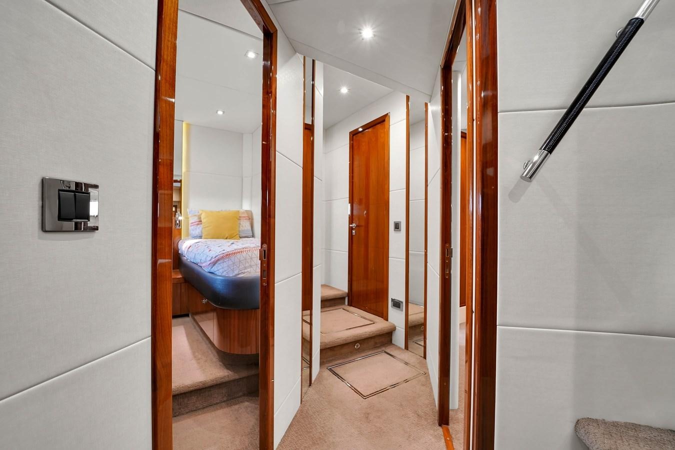 a bathroom with a toilet and a mirror aboard SUNSEEKER 73 2013 Yacht for Sale