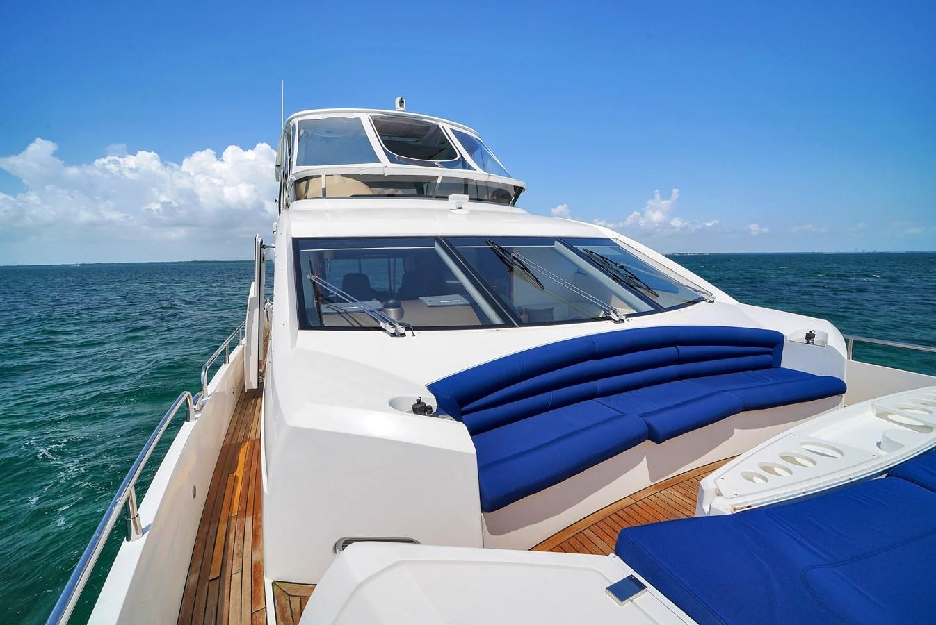 a boat on the water aboard SUNSEEKER 73 2013 Yacht for Sale
