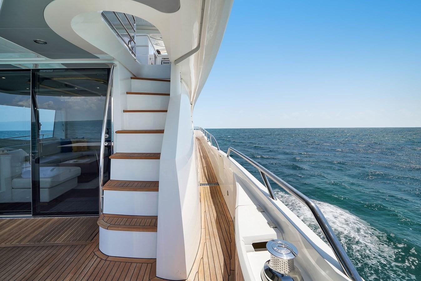 a boat on the water aboard SUNSEEKER 73 2013 Yacht for Sale
