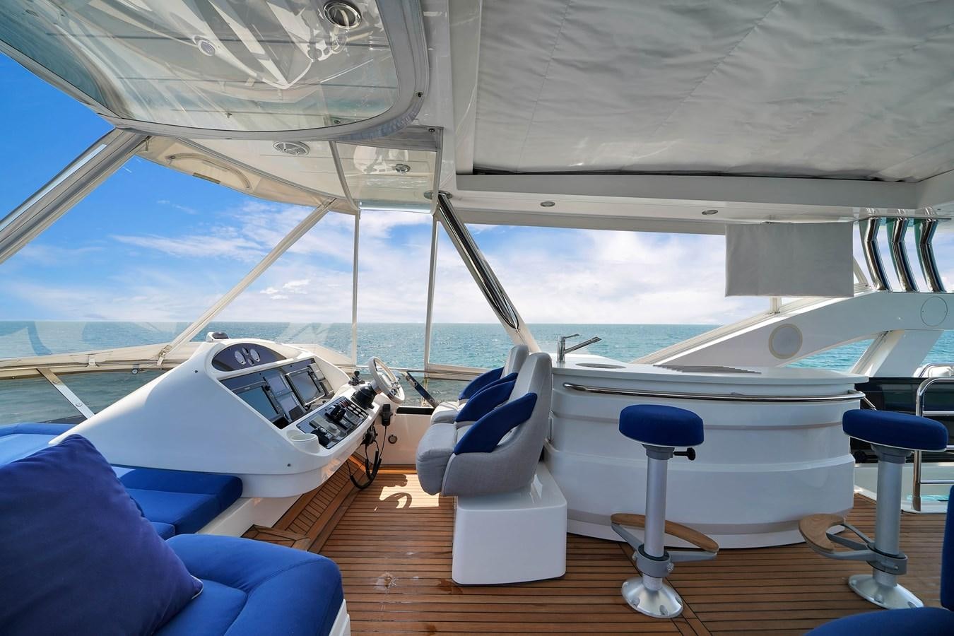 a boat on the water aboard SUNSEEKER 73 2013 Yacht for Sale