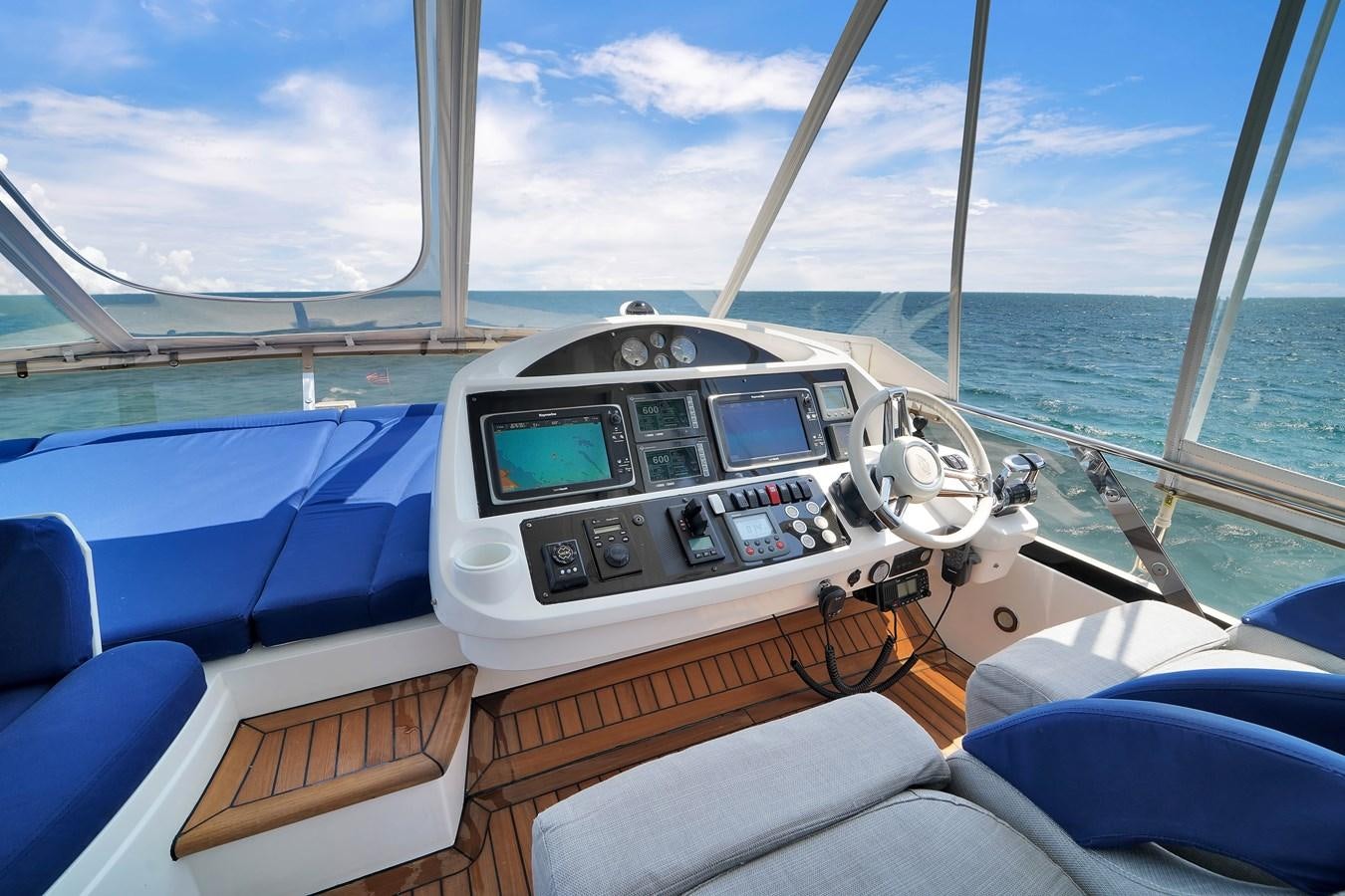 a boat on the water aboard SUNSEEKER 73 2013 Yacht for Sale