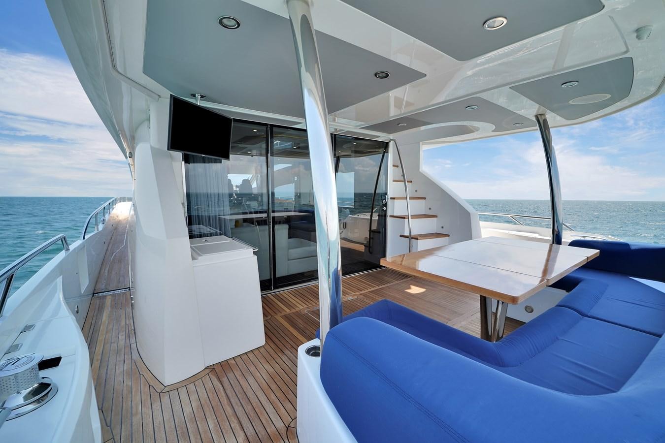 a boat on the water aboard SUNSEEKER 73 2013 Yacht for Sale