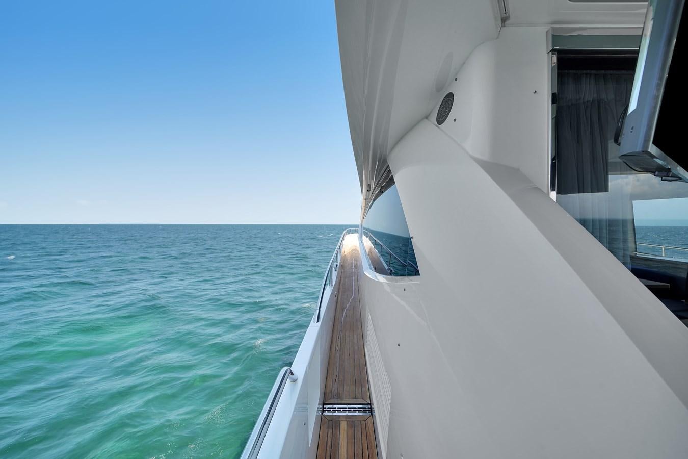 a boat on the water aboard SUNSEEKER 73 2013 Yacht for Sale