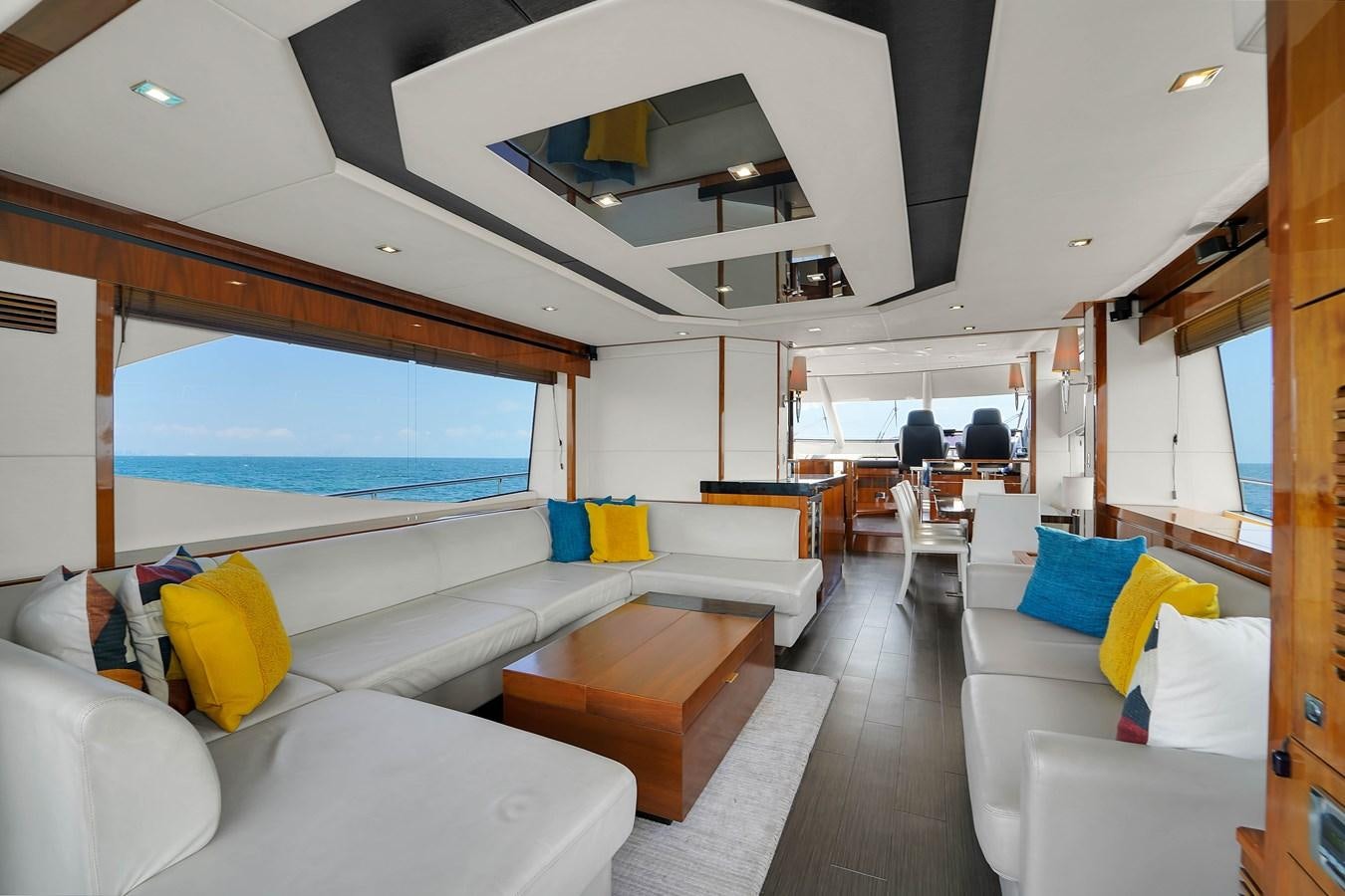 a room with a large window aboard SUNSEEKER 73 2013 Yacht for Sale