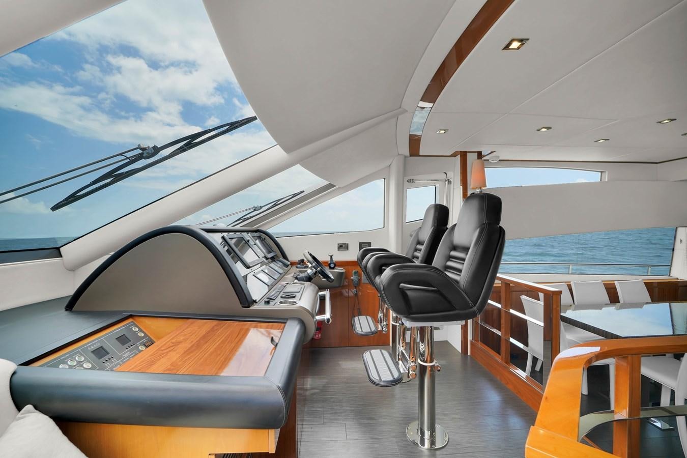 a boat with a desk and chairs aboard SUNSEEKER 73 2013 Yacht for Sale