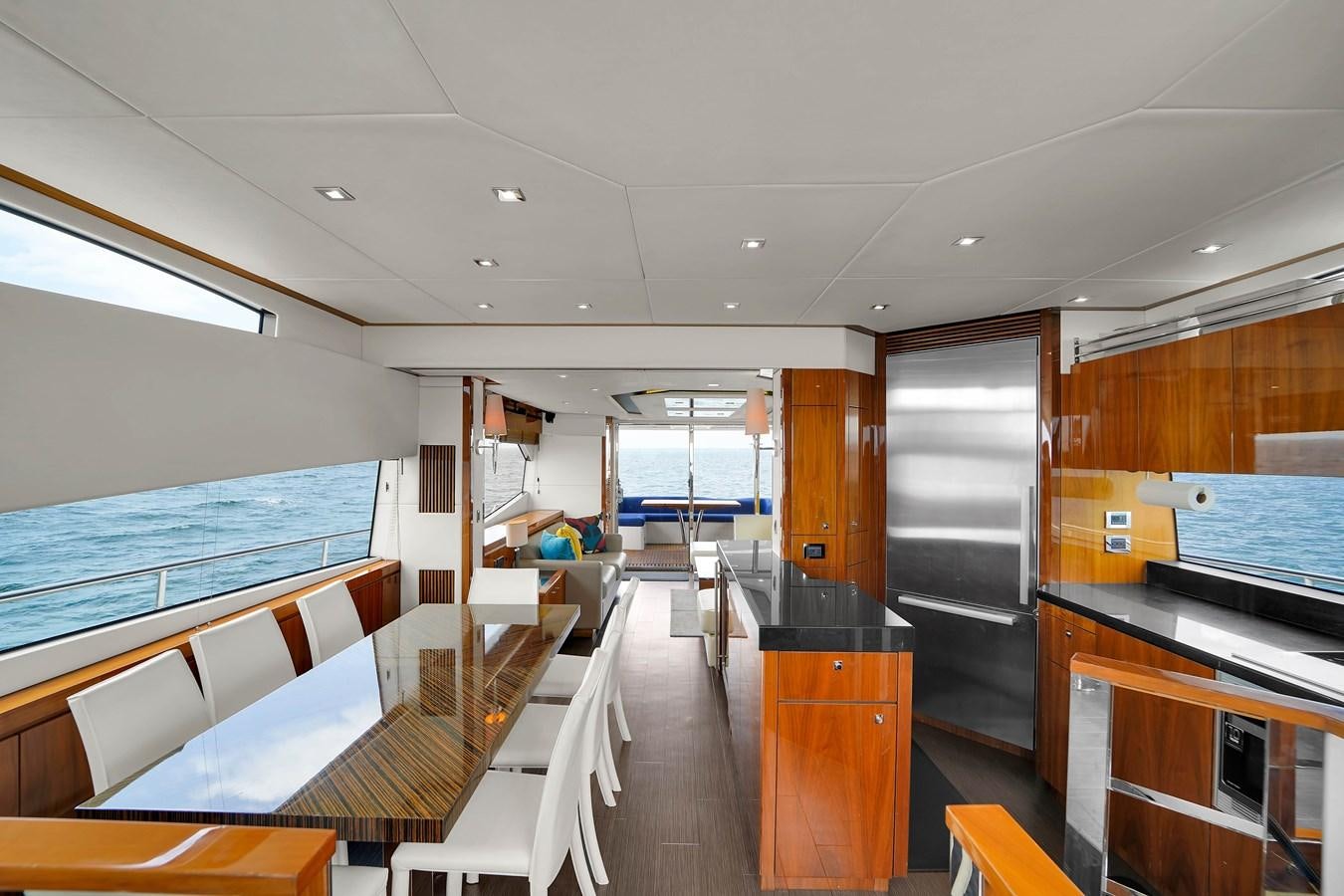 a room with a large window and a view of the ocean aboard SUNSEEKER 73 2013 Yacht for Sale