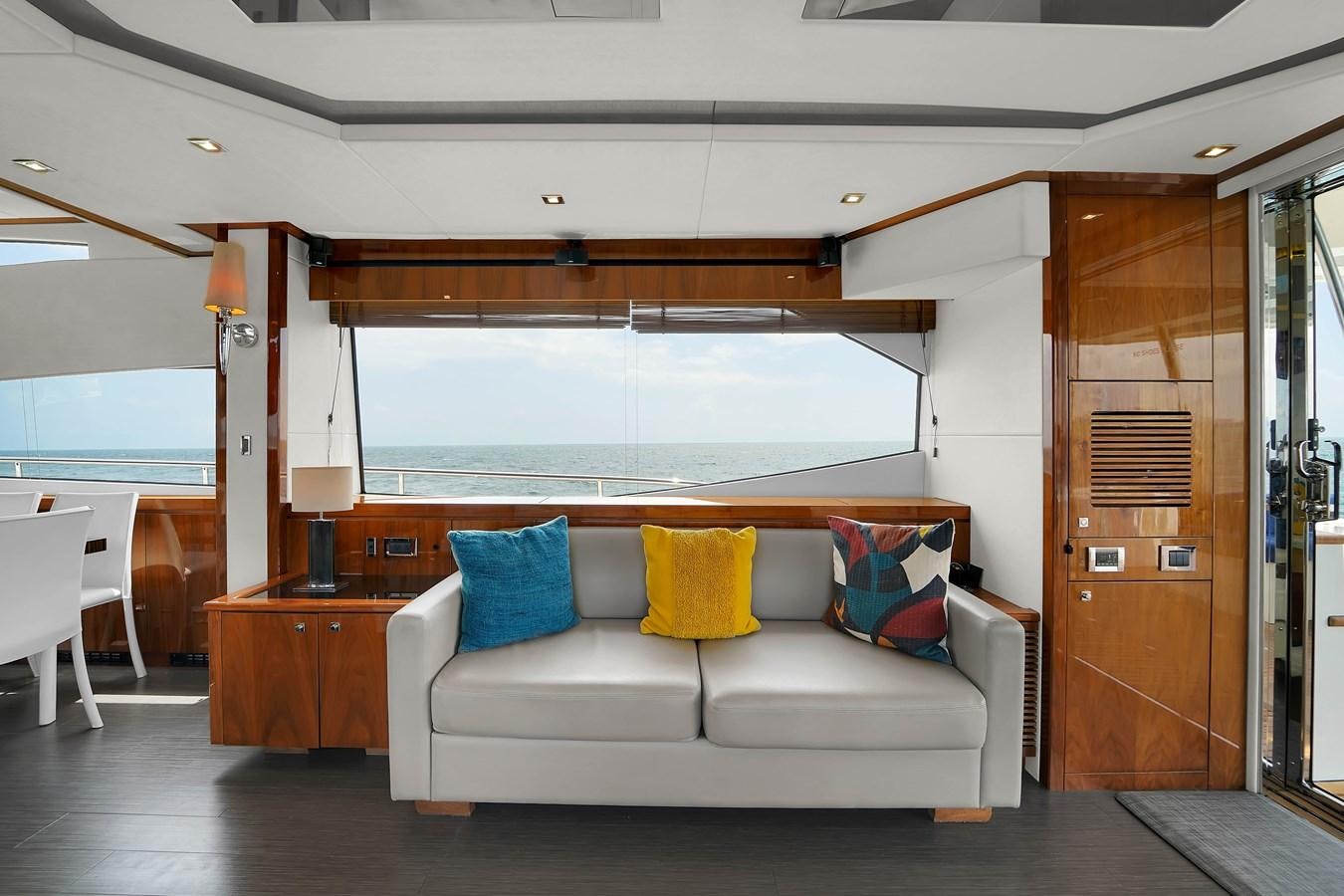 a living room with a couch aboard SUNSEEKER 73 2013 Yacht for Sale