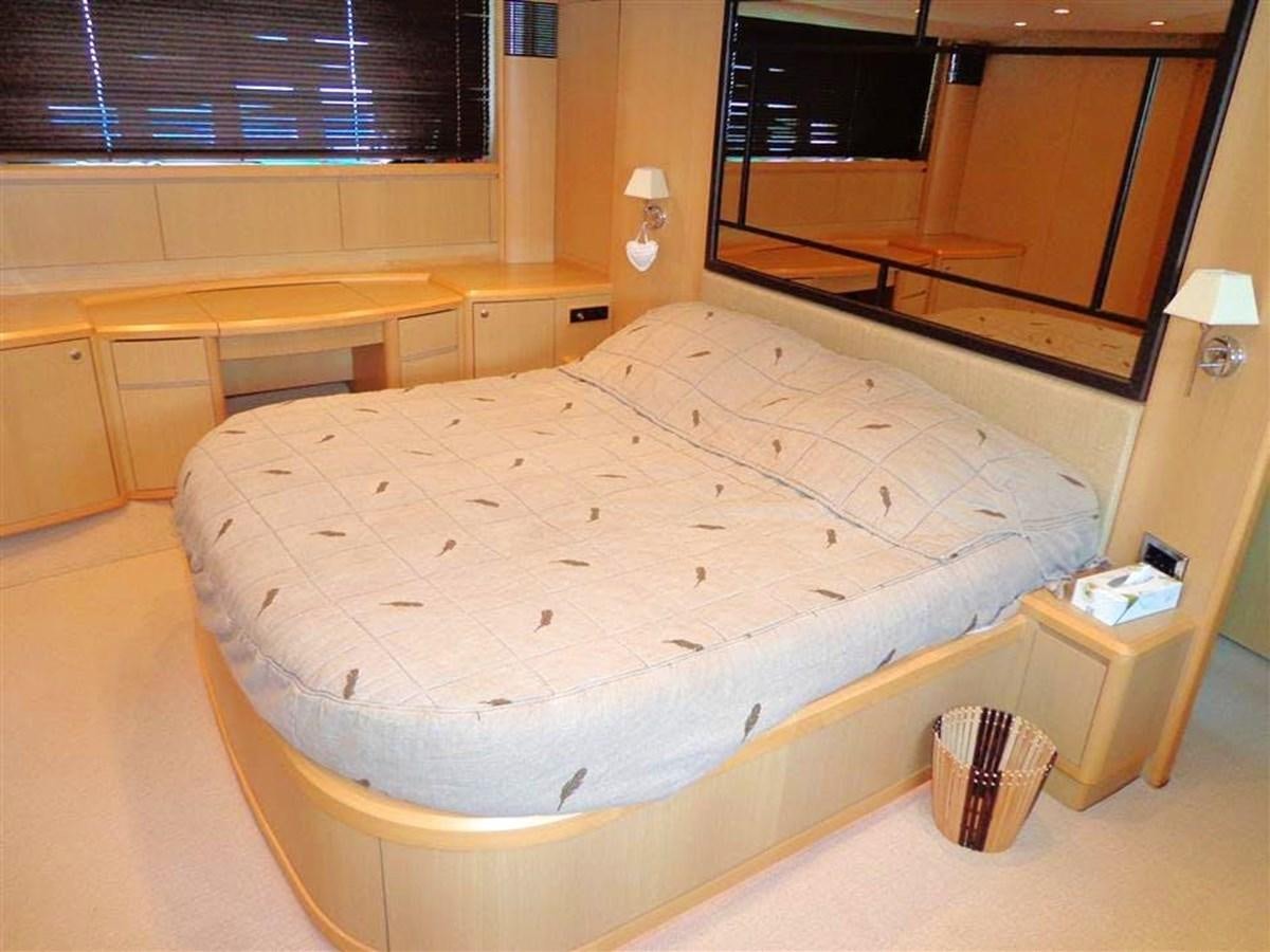 a bed in a room aboard SEA HUSSEIN Yacht for Sale