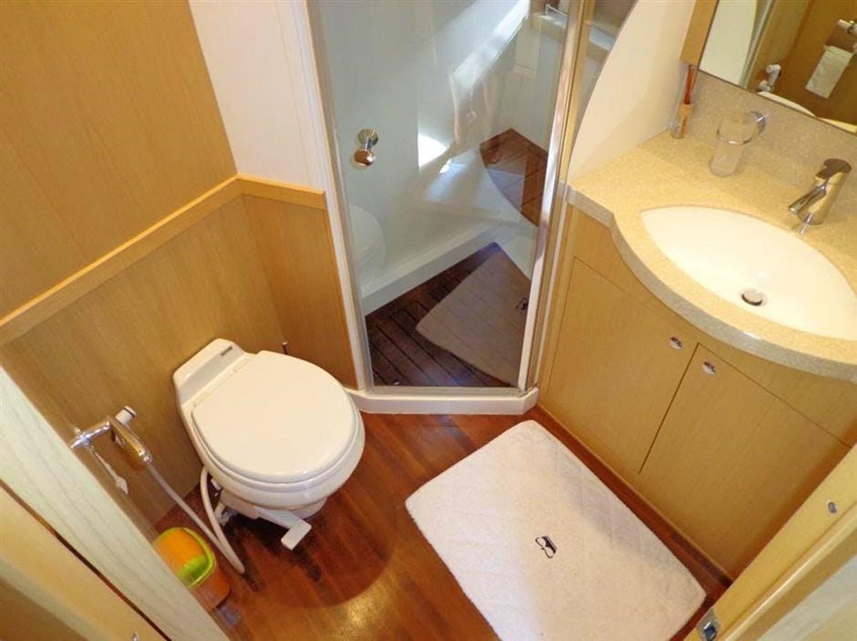 a bathroom with a shower and toilet aboard SEA HUSSEIN Yacht for Sale