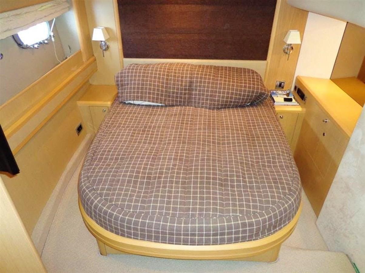 a bed in a room aboard SEA HUSSEIN Yacht for Sale