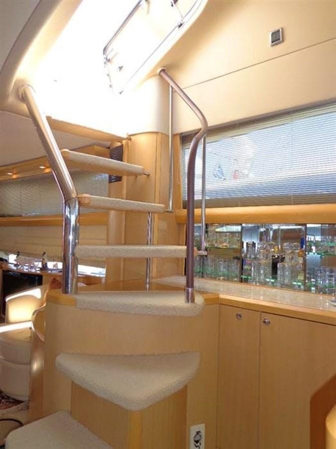 a room with a bar and shelves aboard SEA HUSSEIN Yacht for Sale
