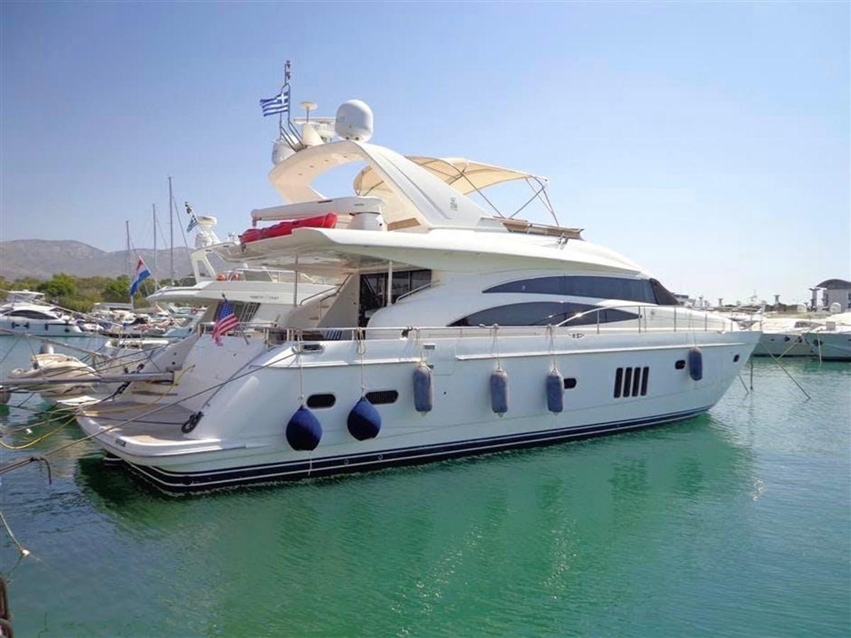 a large white boat in a harbor aboard SEA HUSSEIN Yacht for Sale
