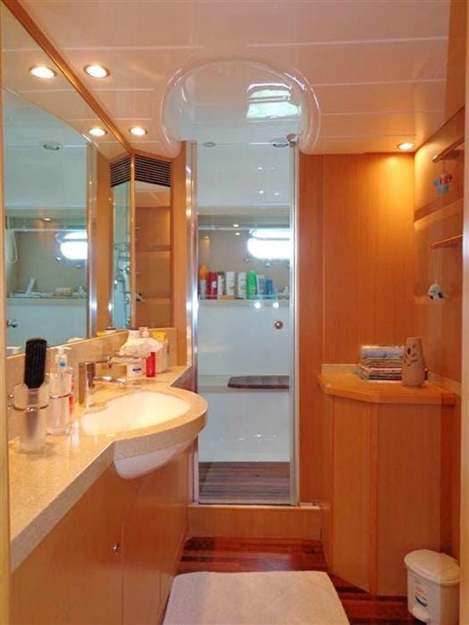 a bathroom with a shower and sink aboard SEA HUSSEIN Yacht for Sale