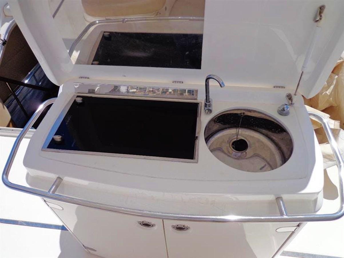 a washing machine with a hole in the side aboard SEA HUSSEIN Yacht for Sale