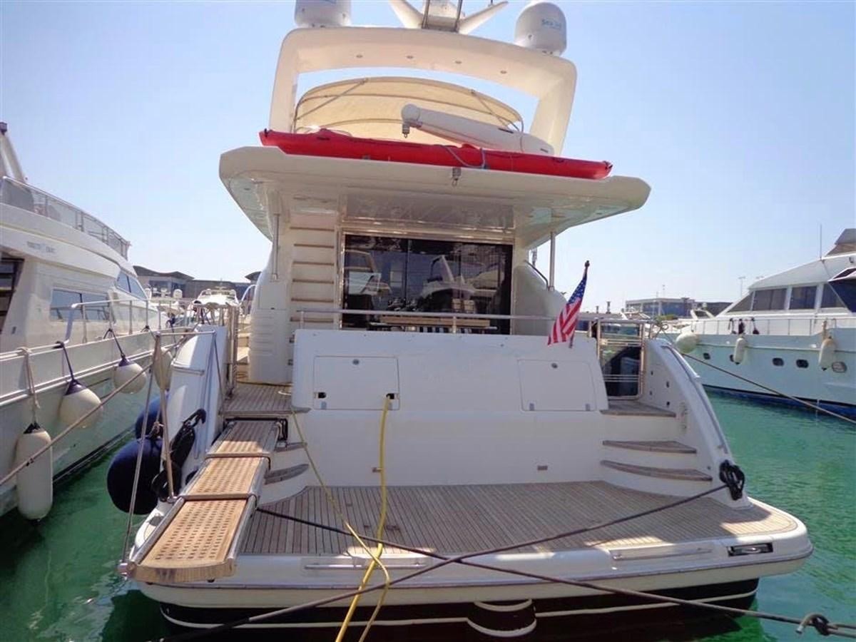 a boat docked at a pier aboard SEA HUSSEIN Yacht for Sale