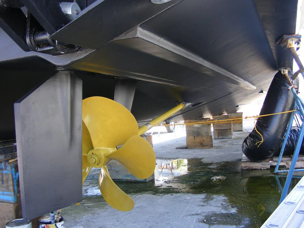 a large yellow balloon under a bridge aboard GRAVITAS Yacht for Sale